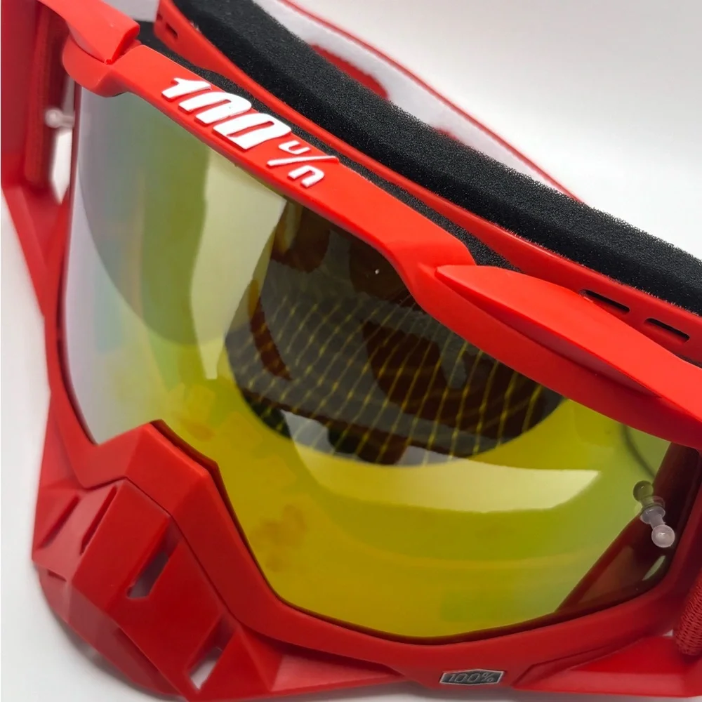 Red 100% goggles comes with peal offs and a removable nose guard